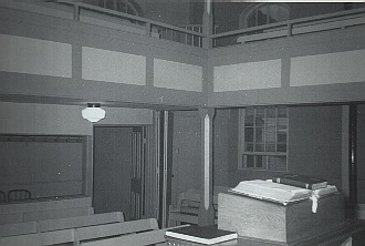 Inside Bethany Church with platform and pews